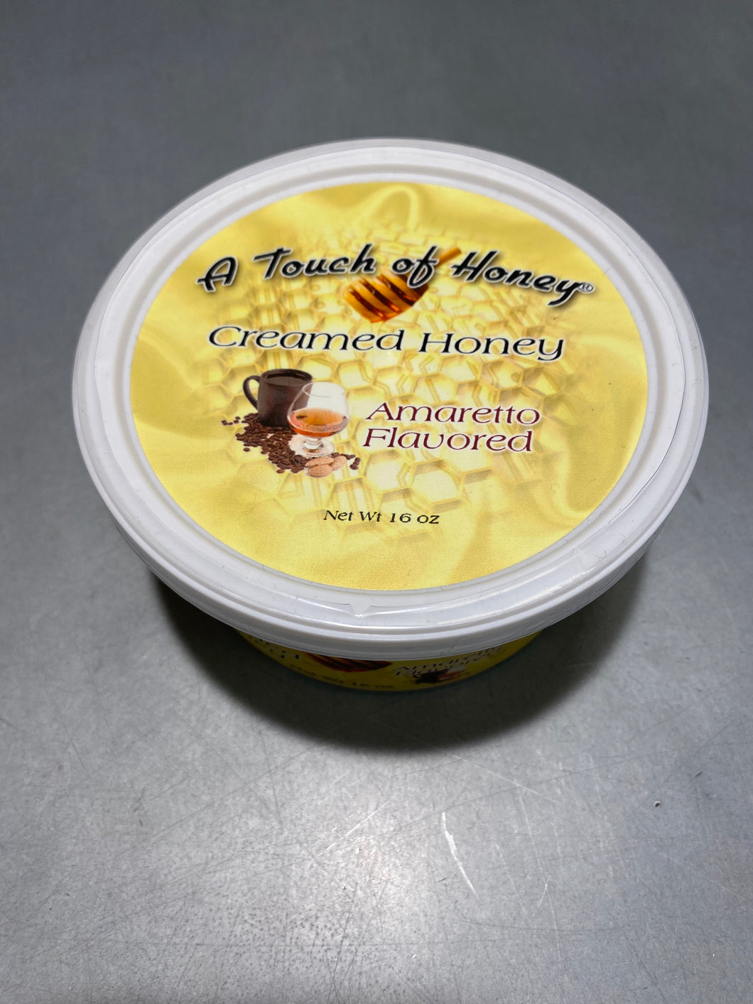 A Touch of Amaretto Flavored Creamed Honey 1 pound tub